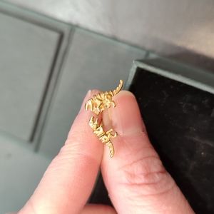 COACH Rexy gold toned earrings with crystal eye detail